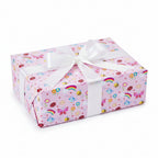 Light pink fabric with a colorful cartoon pattern featuring rainbows, ladybugs, bees, butterflies, flowers, and small birds.